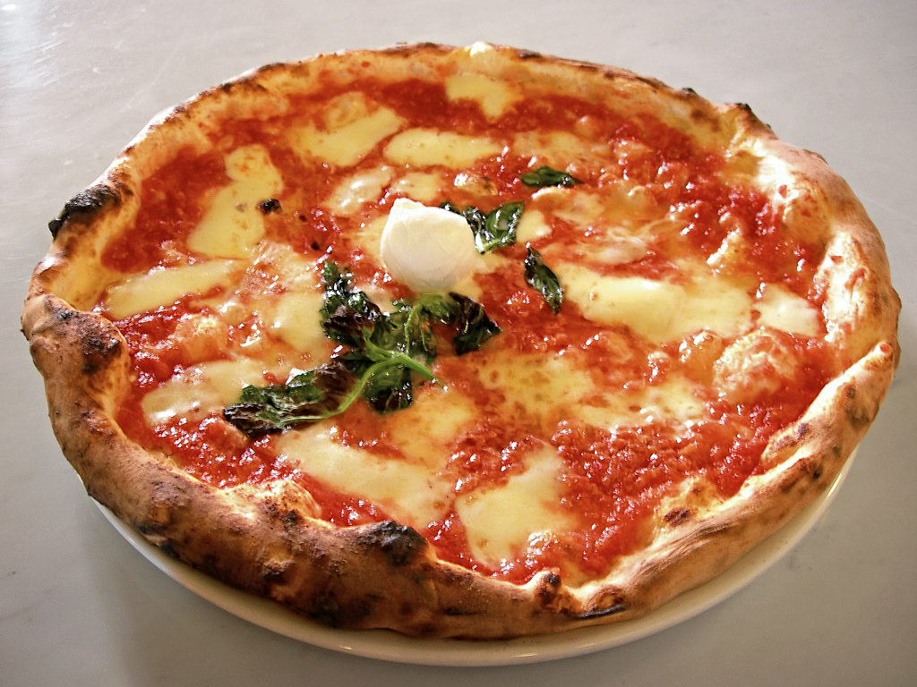 Classic Neapolitan pizza with basil