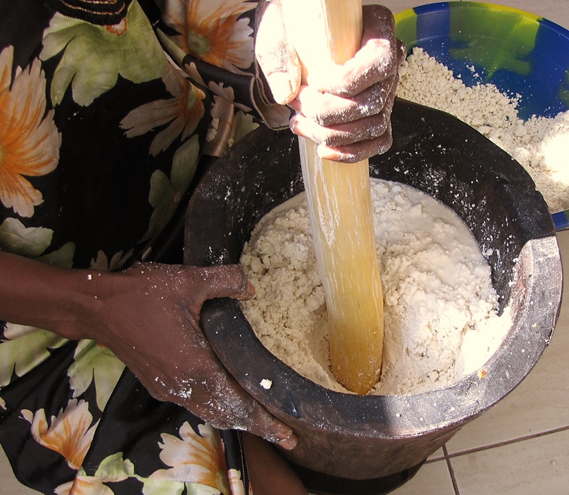 Hands kneading pizza dough